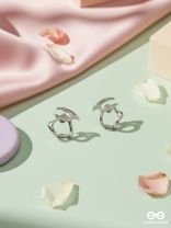 SOFT ANGLES – MODERN SILVER STUD EARRINGS