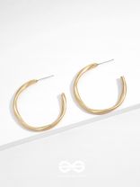 The Subtle Affirmation Golden Twists Hoop Earrings