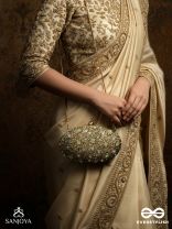 CHANDRAAYA – POLISHED OVAL GOLDEN BRONZE SILK CLUTCH WITH INTRICATE JEWEL STONE EMBELLISHMENT AND GOLDEN METAL FRAME