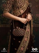 NAZRANA – CURVED MAROON SHADE TEXTILE CLUTCH WITH ORNAMENTED GRID EMBELLISHMENT AND GOLDEN METAL FRAME