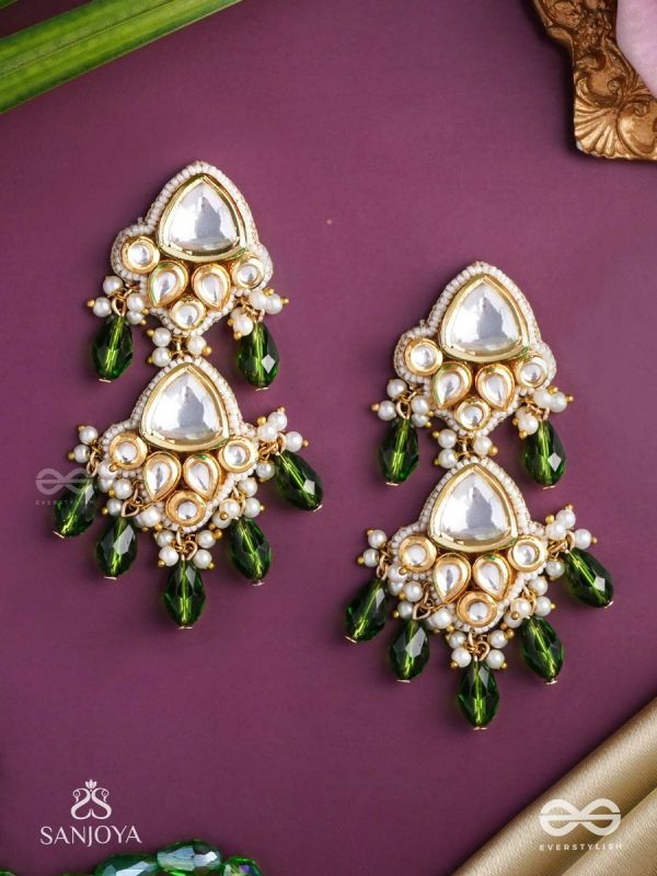 Kundalāṅgī-Kundan Elegance- Traditional pearl and Kundan earrings adorned with beads, stones, and green danglers for a regal touch.