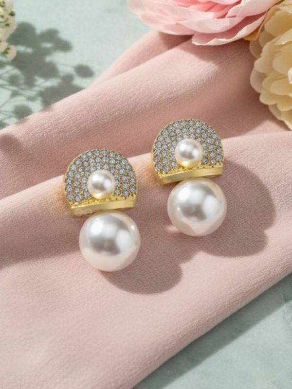 Crystal orbits-  crystal studded statement earrings with dropping pearls 