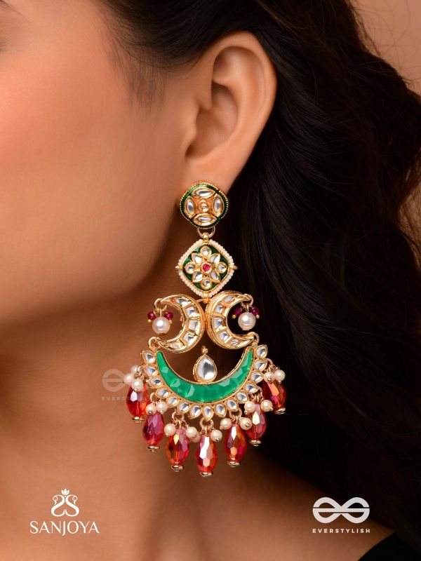 CHANDRAPRIYA " BELOVED OF THE MOON" GOLD LIKE DESIGN WITH A BLEND OF PEARLS, KUNDAN, VIBRANT RED DROPS AND CRESCENT MOTIFS