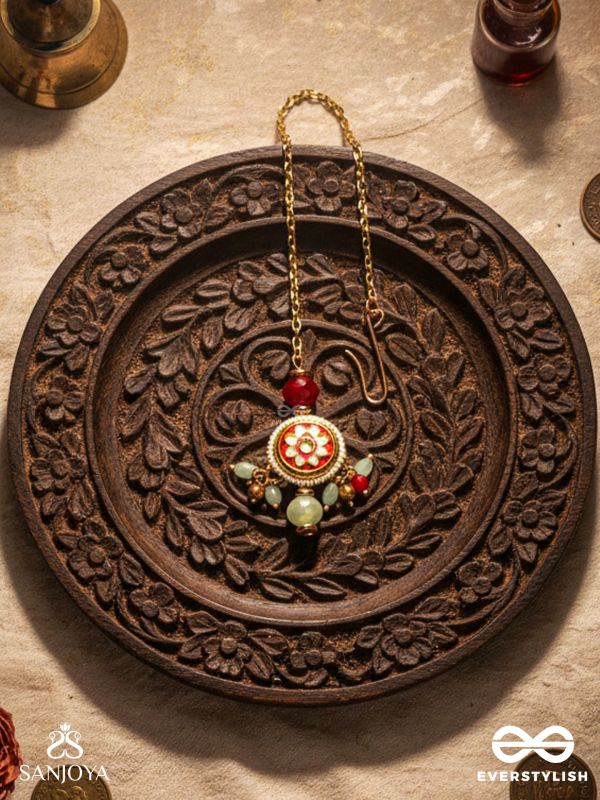 SHONAPRABHA- RADIANCE OF GOLD AND RED- HANDCRAFTED KUNDANMAANGTIKA  WITH GOLDEN MOONS AND RED BEADS