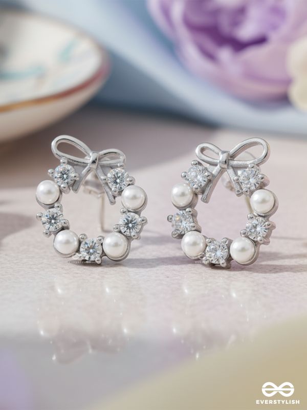 RIBBON PEARL – LUSTROUS BOW-TOP SILVER EARRINGS