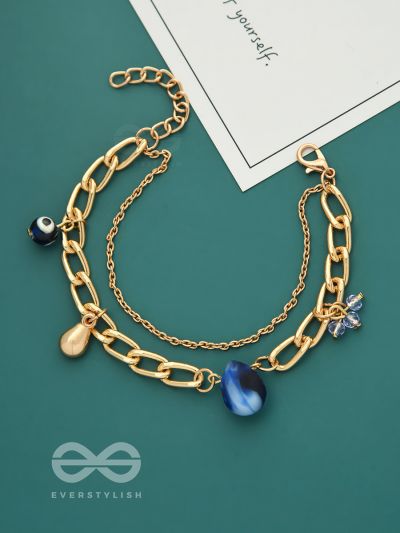 The Indigo Imprint- Evil Eye Stone and Blue Crystals Studded Golden Bracelet