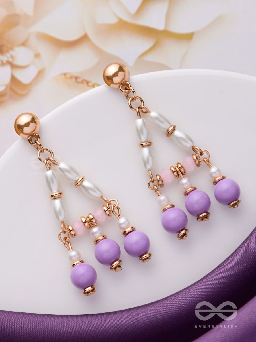 White beaded passa earrings by Heer House Of Jewellery | The Secret Label