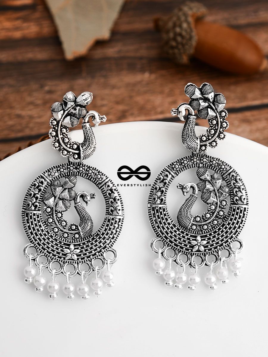 Buy Chunky Huggie Hoop Earrings Online Cheap, Water drop hoop earrings,  Glitteratti Glam, trendy earrings, Online Shopping, Kundan set, Ishhaara  Meenakari Collections for Women & Girls Online. Water drop stud earrings,  trendy