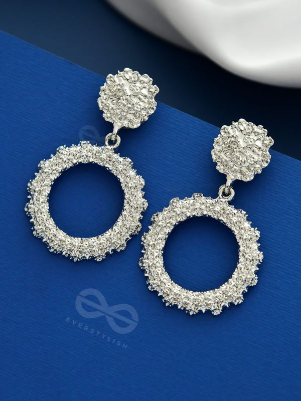 SHIMMERING SOLAR FLARES SILVER STATEMENT EARRINGS