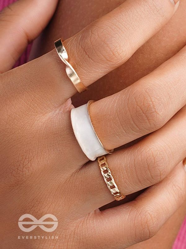 THREE CHEERS- SET OF THREE WHITE AND ROSE GOLD RINGS