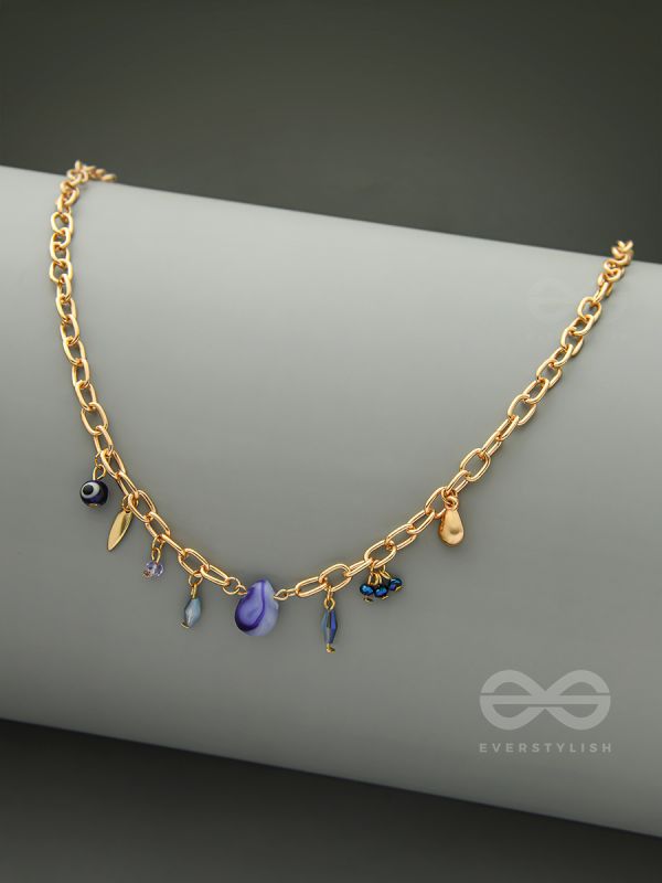 Fragments of the Sky- Blue Crystals Studded Golden Necklace