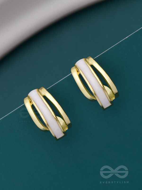 A CLASSY DAME - WHITE ENAMELLED GOLDEN STUDS