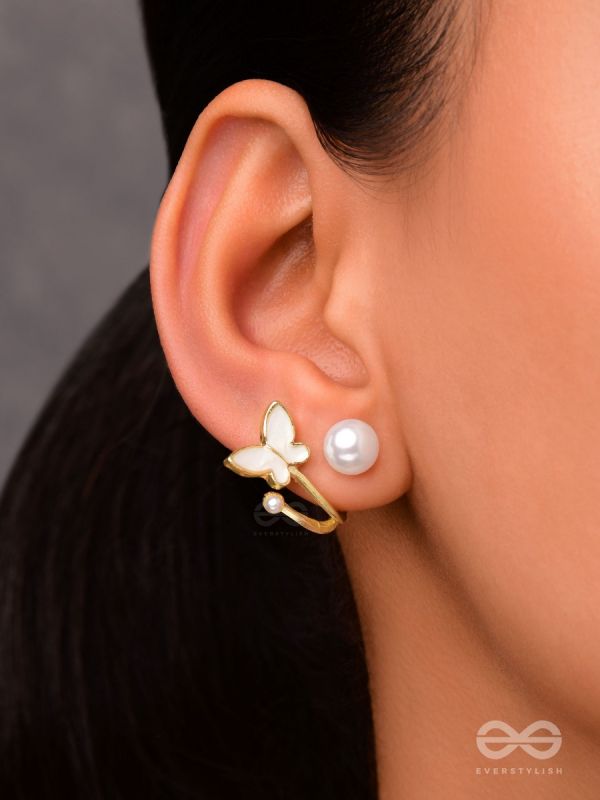 A WINGED WONDER - GOLDEN AND WHITE EAR JACKETS