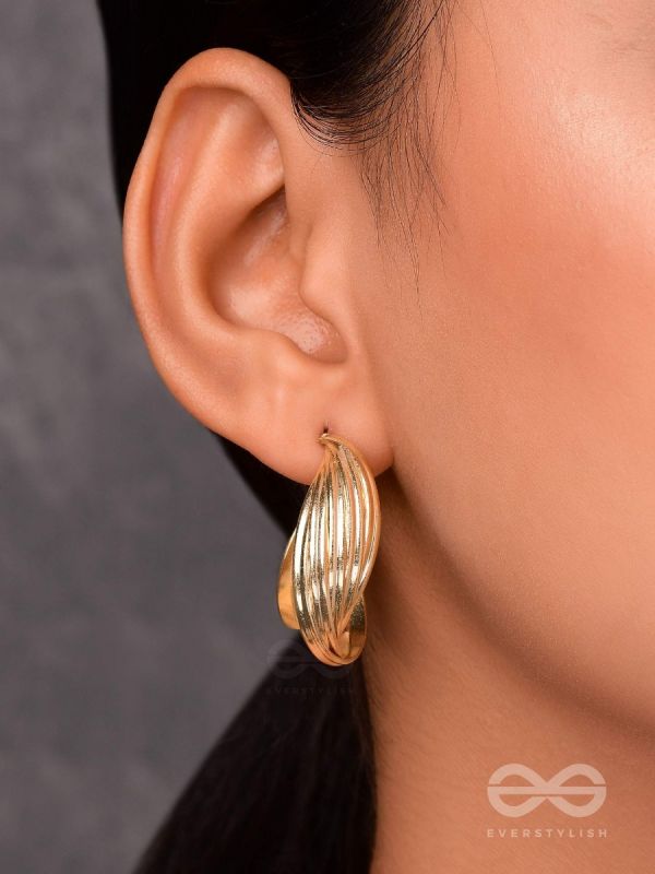 LEVELING IT UP - STATEMENT GOLDEN HOOPS