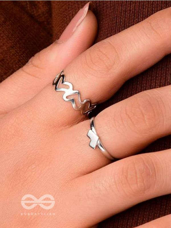LOVE PUZZLE - SET OF 2 SILVER RINGS