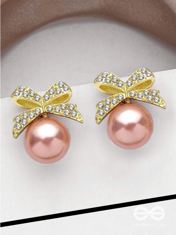 BOW-DAZZLE PEARLS - GOLDEN AND PINK EMBELLISHED EARRINGS