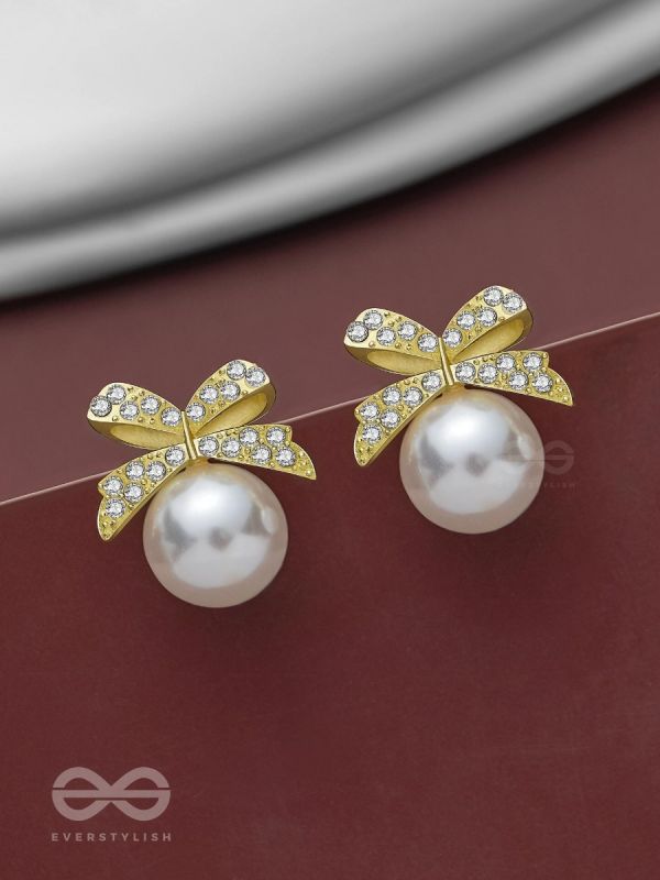 BOW-DAZZLE PEARLS - GOLDEN AND WHITE EMBELLISHED EARRINGS