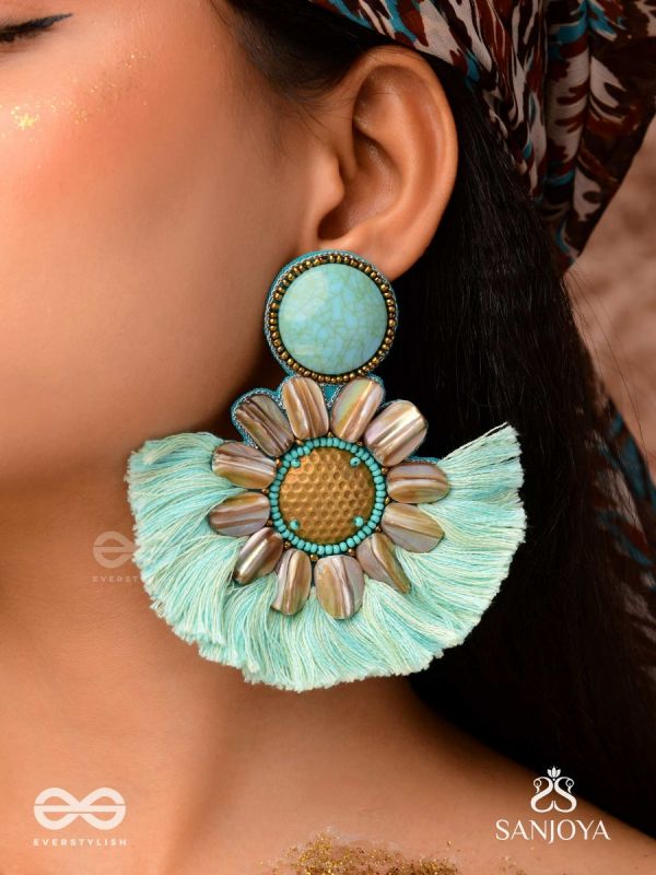 Vibhusitpuspa - the adorned flower - embroidered flower earrings with turquoise tassles