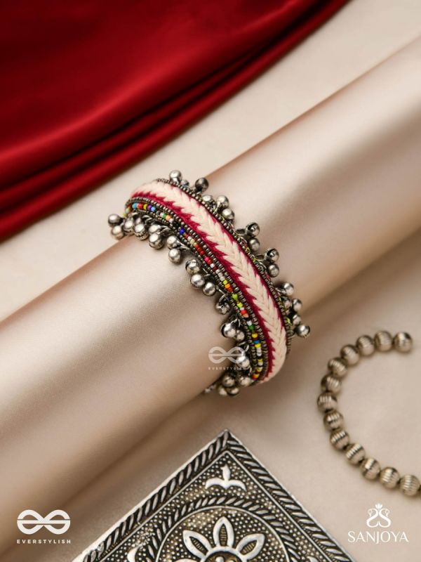 SHAKHAABANDHA- BRANCH BIND- OXIDIZED HAND EMBROIDERED BRACELET, THREAD WORK ACCENTED WITH GHUNGROO AND BEADS