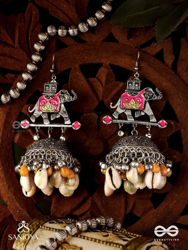 GAJASANKHA KARṆIKA- ELEPHANT-SHELL EARRINGS- OXIDIZED EARRINGS FEATURING AN ELEGANT MOTIF, DELICATE GHUNGHROO'S, AND COWRIE SHELLS