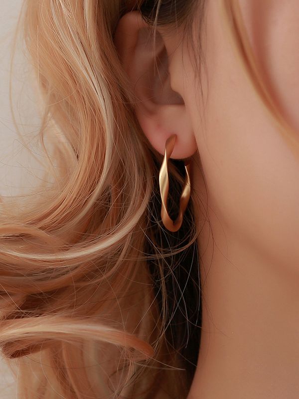 The Subtle Affirmation Golden Twists Hoop Earrings